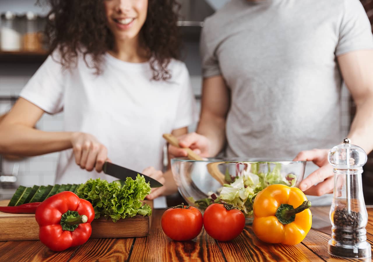 A couple cooking together