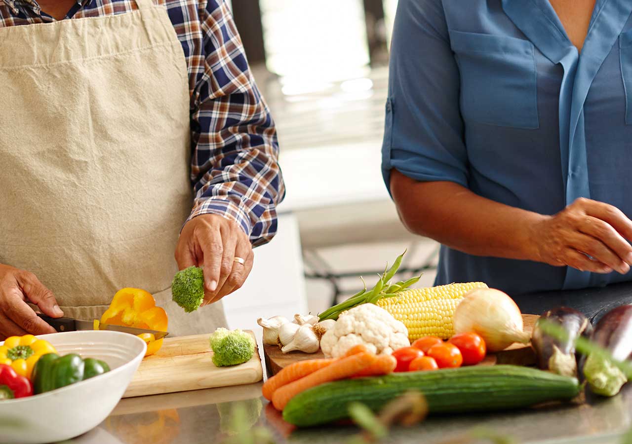 A couple cooking together