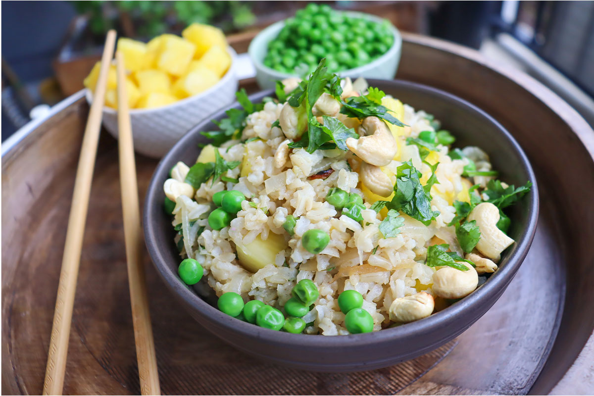 https://cdn.nutritionstudies.org/wp-content/uploads/2022/09/pineapple-fried-rice-1.jpg